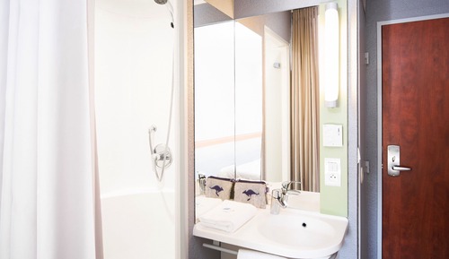 Habitación triple, varias camas