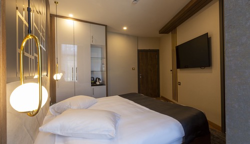 Suite ejecutiva, terraza, vistas al jardín