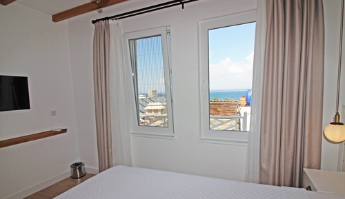 Habitación Confort, vistas parciales al mar