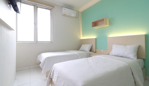 Habitación con 2 camas individuales