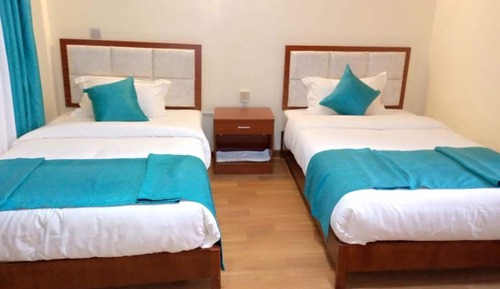 Habitación con 2 camas individuales