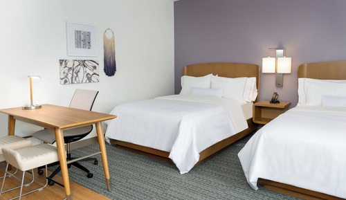 Estudio, varias camas