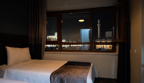 Habitación cuádruple Deluxe, vistas a la ciudad