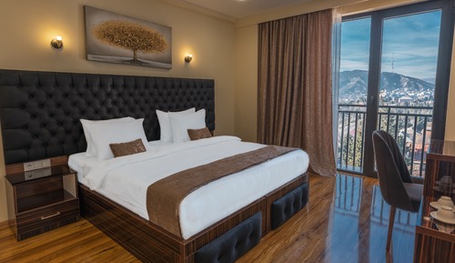 Habitación Deluxe con 1 cama doble o 2 individuales, vistas a la ciudad