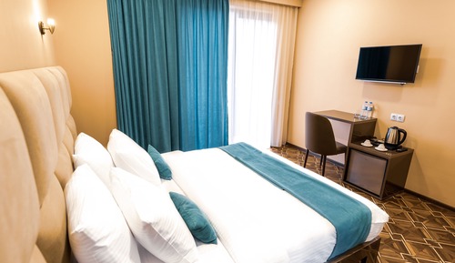 Habitación estándar con 1 cama doble o 2 individuales