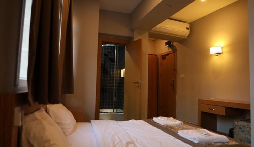 Estudio Confort, baño privado, vistas a la ciudad