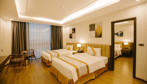 Habitación familiar, varias camas, vistas al jardín