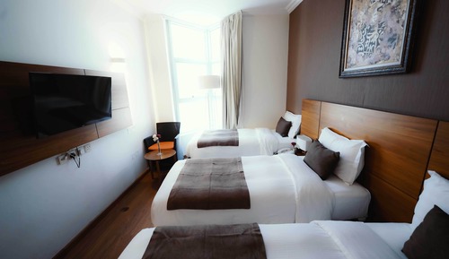 Habitación triple Deluxe