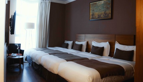 Habitación cuádruple Deluxe