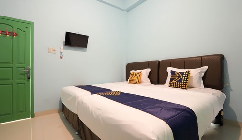 Habitación básica con 2 camas individuales