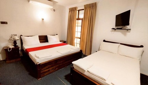 Habitación triple Deluxe