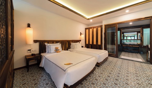 Habitación Premium con 2 camas individuales, varias camas, vistas parciales al mar