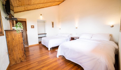 Habitación cuádruple, 2 camas dobles, no fumadores, vistas a la montaña