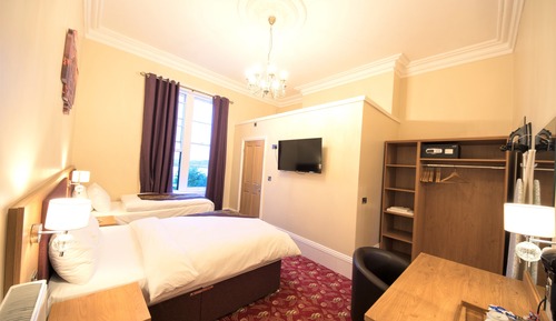 Habitación familiar, varias camas