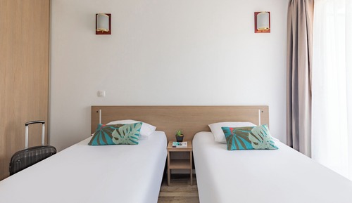 Estudio, 2 camas individuales