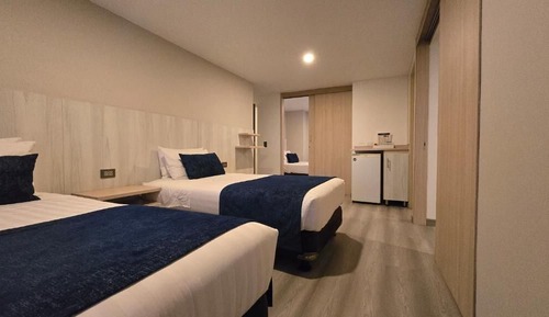 Habitación tradicional con 2 camas individuales