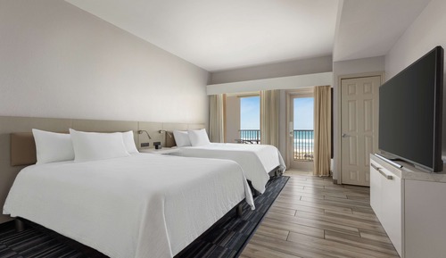 Suite junior, 2 matrimoniales, vistas a la piscina