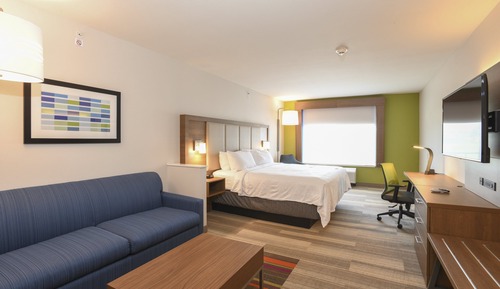 Suite, 1 cama de matrimonio grande (Mobility, Access Tub, Living Area)