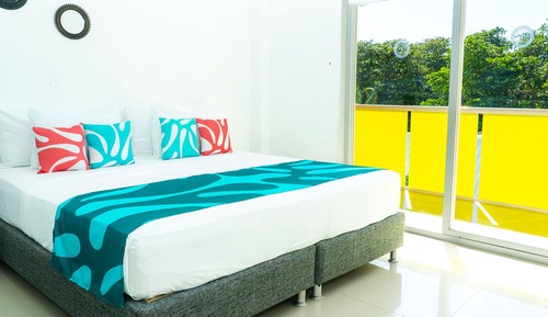 Habitación triple, vistas al mar