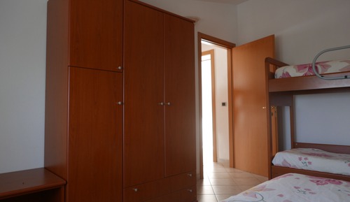 Habitación familiar, varias camas, baño privado, en una planta alta