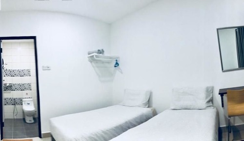 Habitación con 2 camas individuales