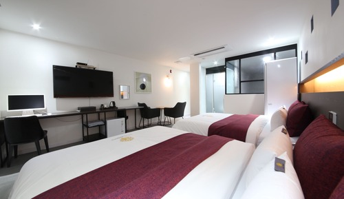 Habitación Business con 2 camas individuales, 2 camas dobles