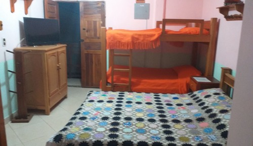 Habitación familiar, varias camas