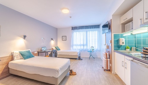 Estudio superior, 2 camas individuales