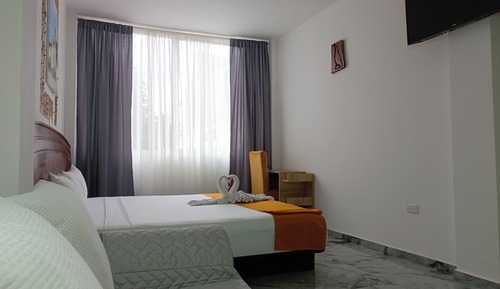 Habitación con 1 cama doble o 2 individuales, vistas al jardín