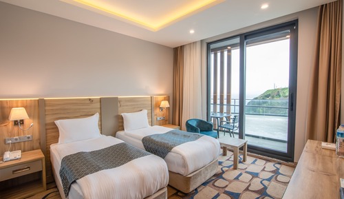 Habitación Deluxe, 1 cama de matrimonio grande, vistas al mar