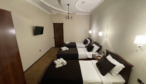 Habitación triple Deluxe