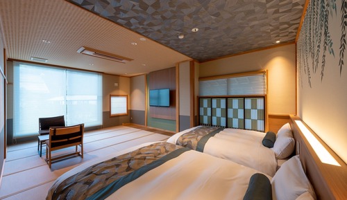 Habitación básica con 2 camas individuales