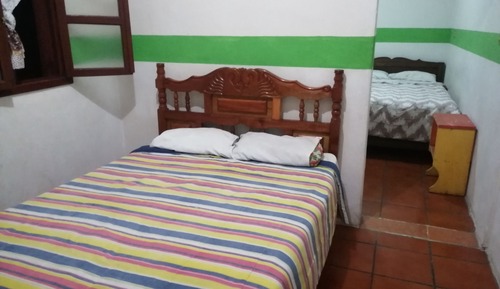 Habitación familiar, varias camas