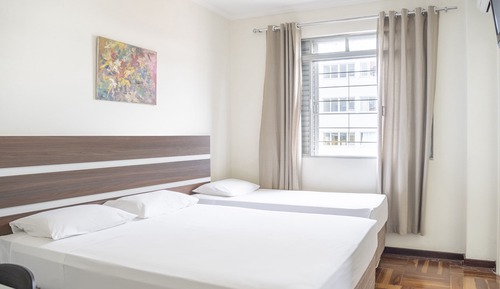 Habitación triple, varias camas