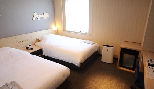 Habitación con 2 camas individuales