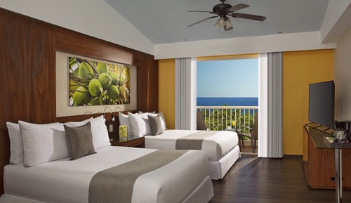 Habitación de lujo, 2 camas dobles, vistas parciales al mar