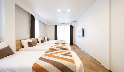 Habitación cuádruple Deluxe