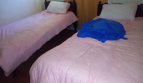 Habitación con 2 camas individuales