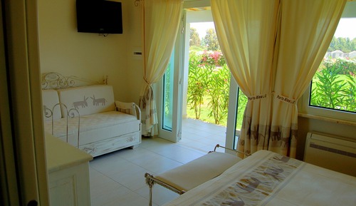 Habitación familiar, patio, en la zona del jardín