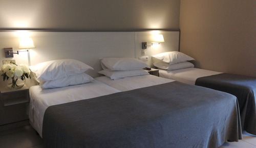 Habitación triple familiar, varias camas