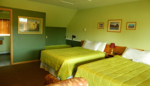 Habitación cuádruple Deluxe (2 Queen Beds with a Sofa Bed)