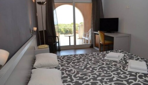 Habitación triple, vistas al mar