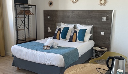 Habitación triple, vistas al mar