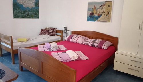 Estudio clásico, varias camas