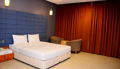 Habitación Deluxe con 1 cama doble o 2 individuales