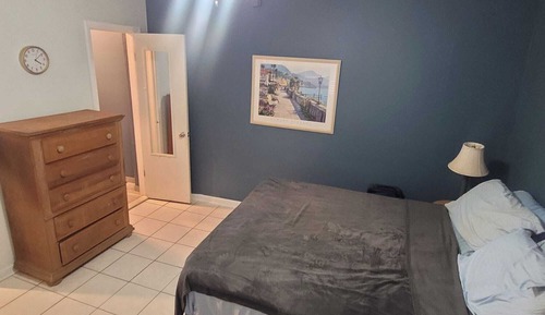 #5 =Ocean Breeze = 1 bedroom with a queen sized bed