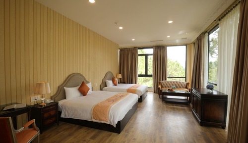 Habitación cuádruple Deluxe, vistas al jardín