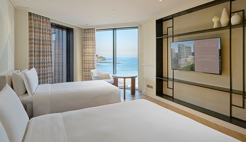 Habitación Deluxe con 2 camas individuales, vistas parciales al mar