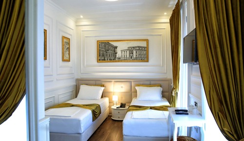 Habitación de lujo con 2 camas individuales