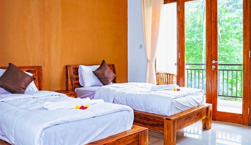 Habitación Deluxe con 2 camas individuales, varias camas